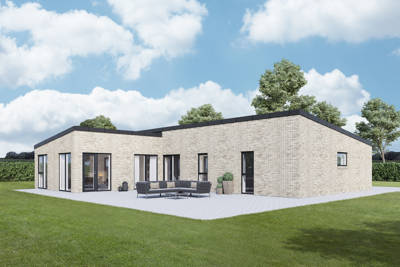 Lyst typehus fra hven med fliseterrasse